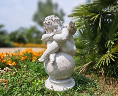 Садовая фигура Ангел спящий на шаре, 60х38 см.