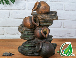 Фонтаны для сада и интерьера из полистоуна.