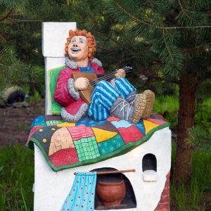 Скульптура Мальчик на печи 130х90х60 см.